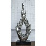 ARABIC SYMBOL SCULPTURE, polished metal, on stand, 93cm H overall.
