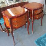 BEDSIDE CHESTS, a pair, French style each with two drawers and cabriole supports with gilt mounts,