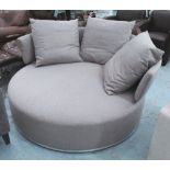 B&B ITALIA SOFA, circular, on swivel base in beige fabric with three scatter cushions, 165cm diam.