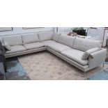 CORNER SOFA, by Zanotta, in beige, on metal supports, 315cm x 265cm.