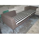 SUN LOUNGERS, a pair, in synthetic all weather woven frame with striped padded seats, 154cm x 97cm.