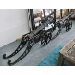 CANNONS, a pair, on carriages, cast iron, 66cm x 146cm.