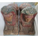SPHINXES, a pair, carved wood, 45cm W x 119cm L.