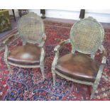 FAUTEUILS, a pair, Louis XVI style, giltwood and tan leather, 65cm W x 97cm H.