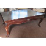 LOW TABLE, mahogany with a rectangular top and carved shell detail on short cabriole supports,