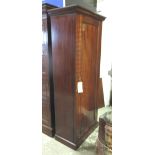 WARDROBE, Victorian figured mahogany with panelled door enclosing hanging space,