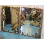 WALL MIRRORS, a pair, with leaf and floral decoration, 86cm W x 114cm H.
