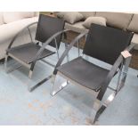 ARMCHAIRS, a pair, chrome and leather of modernist design, each 64cm W x 79cm D x 77cm H.