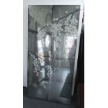 WALL MIRROR, decorative with a cherry blossom motif painted on the plate which is in divided plates,