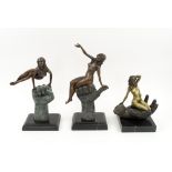 TRIO OF EROTIC BRONZES, each depicting a nude woman on a hand in various poses, marble bases, 37cm,