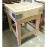 BUTCHERS BLOCK, reversible square end grain and iron bound on stretchered support,