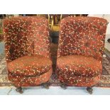 TUB CHAIRS, a pair, early 20th century with high curved backs in brown floral upholstery, 64cm W.