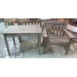 GARDEN ARMCHAIR AND TABLE, weathered slatted teak, the table 91cm x 60cm x 67cm H.