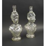 FIGURATIVE DECANTERS, a companion pair moulded glass portraying Prince Albert and Queen Victoria,