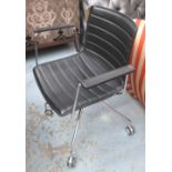 DESK CHAIR, Catifa 46 by Arper, in black stitched ribbed leather on chromed legs with castors,
