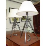 TABLE LAMPS, a pair, Industrial style on extending tripod supports with shades, 99cm H.