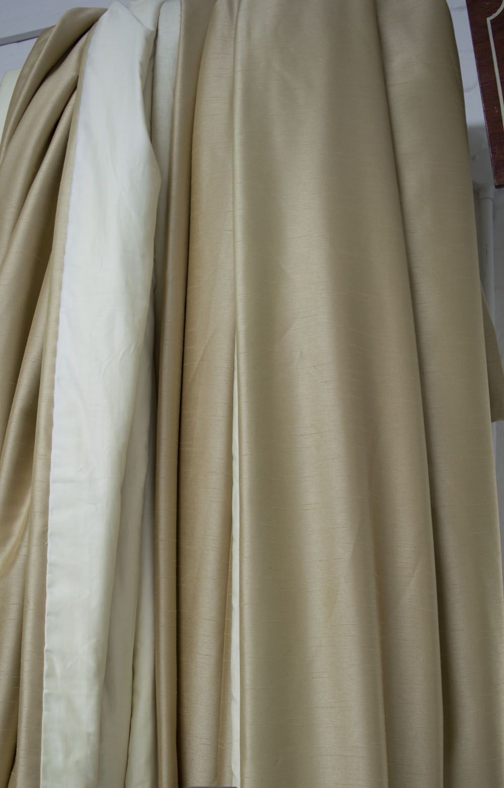 CURTAINS, two pairs, gold lined and interlined, 110cm gathered by 276cm drop.