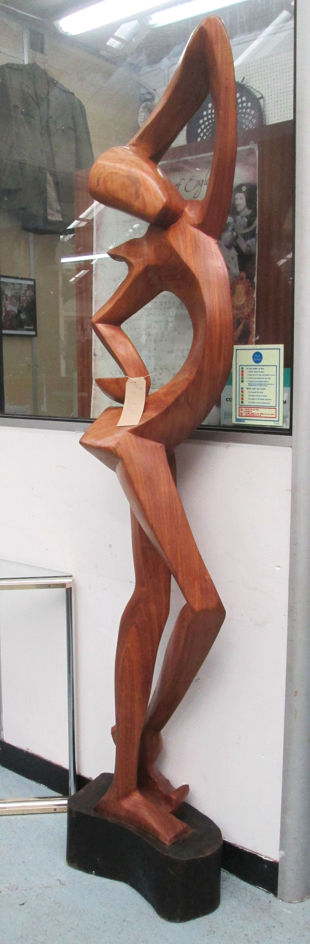SCULPTURE, the last quarter of the 20th century, carved teak, of figure in dance pose,