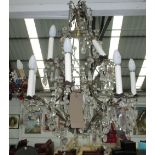 CHANDELIER, with a metal frame and clear droplets, two tiered, 80cm H x 55cm W.