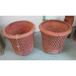 GARDEN PLANTER URNS, a pair, 'Basket' style, 19th century terracotta style, weathered finish,