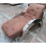 CHAISE LONGUE, in tanned buttoned leather, on chromed metal supports,