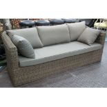 GARDEN SOFA, weather proof wicker with rounded arms and seat and five cushions by Bramblecrest,