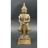 DEMON FACED BRONZE WARRIOR, 20th century Asian, on integral plinth base, 36cm H overall.