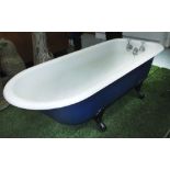 BATHTUB, cast iron on legs with taps, 165cm L x 59cm H x 72cm W.