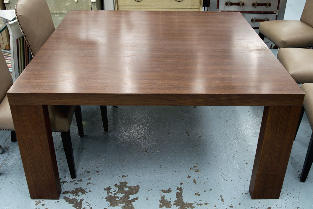 DINING TABLE, Italian walnut, made by Borro, designed by Pierro Lissoni, retails at £2845 new,