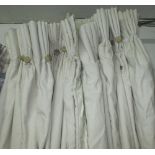 CURTAINS, a pair, 135cm gathered x 240cm dropped, lined and interlined in cream cotton.