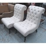 EASY CHAIRS, a pair, in oatmeal fabric on front castors, 70cm W.