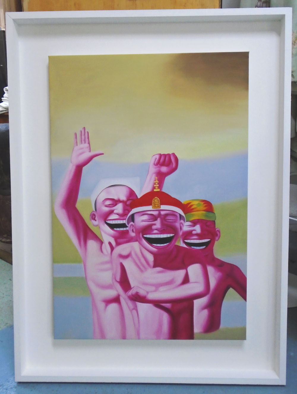 AFTER YUE MINJUN (Chinese, b.1962), 'Figures', giclee print on canvas, 91cm x 62cm, box framed.