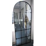 ARCHITECTURAL MIRROR, with domed top on a metal frame, 180cm x 71cm.