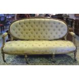 SOFA, Victorian giltwood, in the French taste, with buttoned cream Damask upholstery,