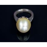 ETERNITY RING, 18k white gold set a cultured pearl and diamonds.
