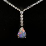 NECKLACE, 18k white gold with opal and diamond drop pendant.