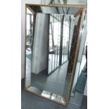 WALL MIRROR, Continental, mid 20th century, with etched angled side panels and oak frame,
