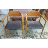 DINING ARMCHAIRS, a set of twelve, 1960s, beech with black vinyl cushioned seats (dated).