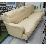 GEORGE SMITH SOFA, in woven sand coloured fabric with three turned front supports,