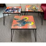 LOW TABLES, a set of three, 1970's Continental, with ceramic tiled tops of abstract form,