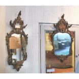 WALL MIRRORS, a pair, 18th/19th century Italian silvered wood with leaf decoration and twin plates,