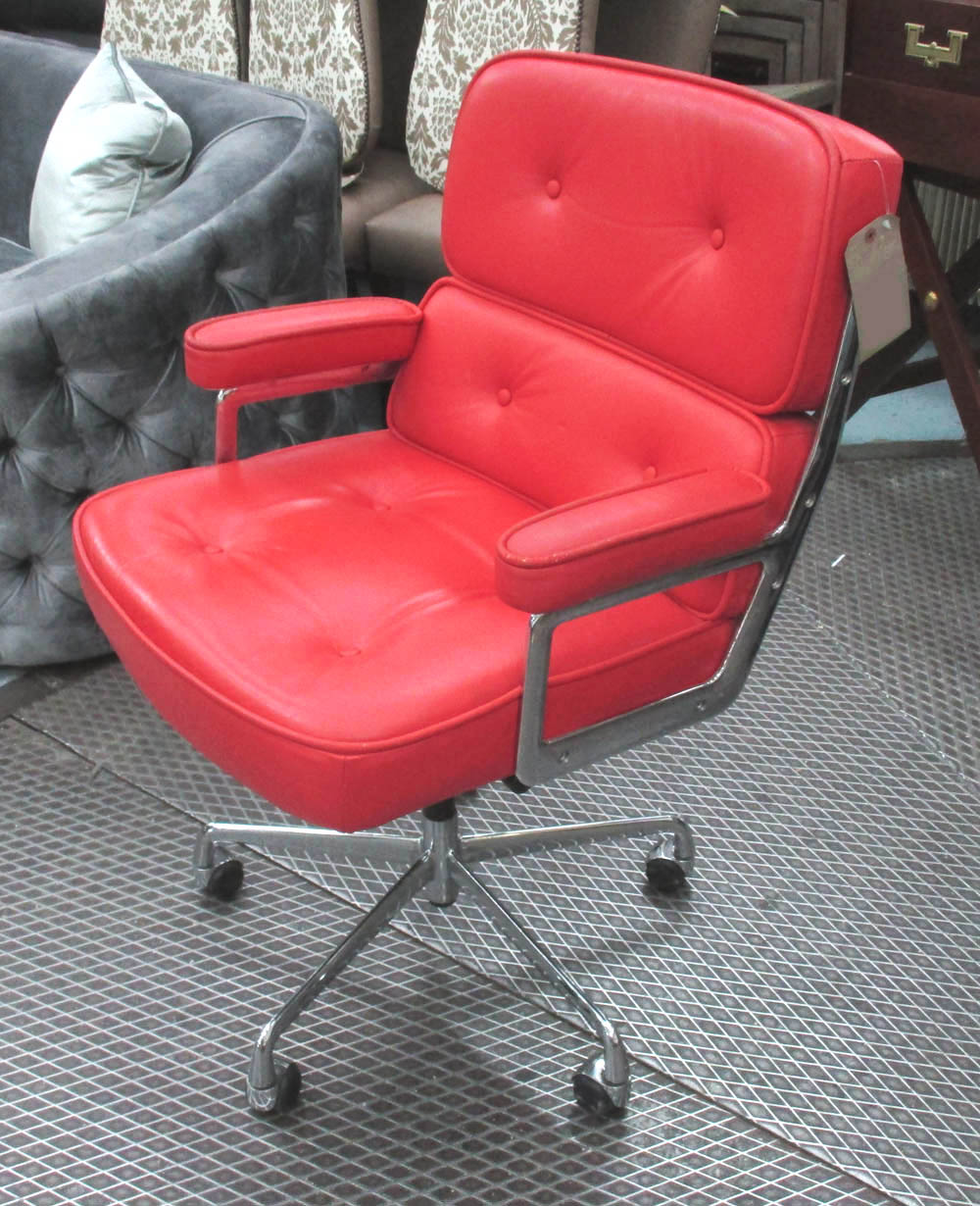 LOBBY STYLE CHAIR, originally by Eames, in a cadmium red leather,