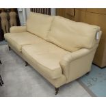 GEORGE SMITH SOFA, in woven sand coloured fabric with three turned front supports,