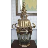 HALL LANTERN, octagonal, brass with scrolled decorative top, 89cm x 51cm.