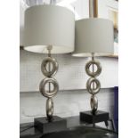 PORTA ROMANA TABLE LAMPS, a pair, metal on bases with grey shades, each 69cm including shades.