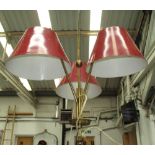 PENDANT CEILING LIGHT, Italian, 1950's, with triform red shades, 107cm H x 50cm W.