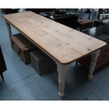 KITCHEN TABLE, of large proportions, pine top on a cream painted base, 81cm D x 225cm L x 75cm H.