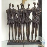 FIGURAL ORNAMENT, of family standing, contemporary style in bronzed resin, 30cm L.