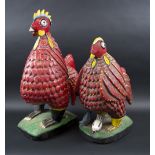 FAT CHICKENS, cock and hen, West African painted and carved wood, 59cm H and 47cm H.