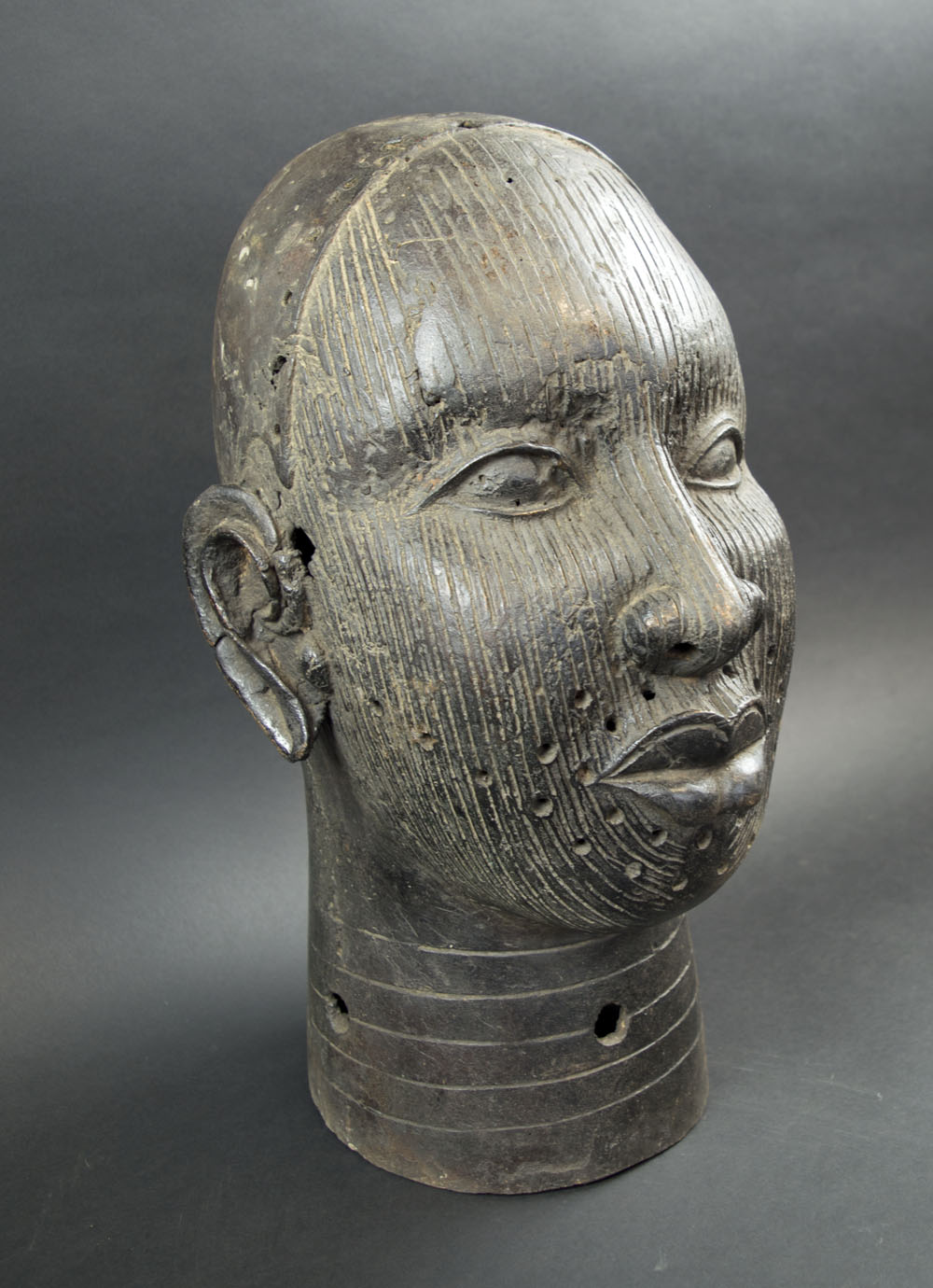 IFE HEAD SCULPTURE, patinated bronze, 39cm H.